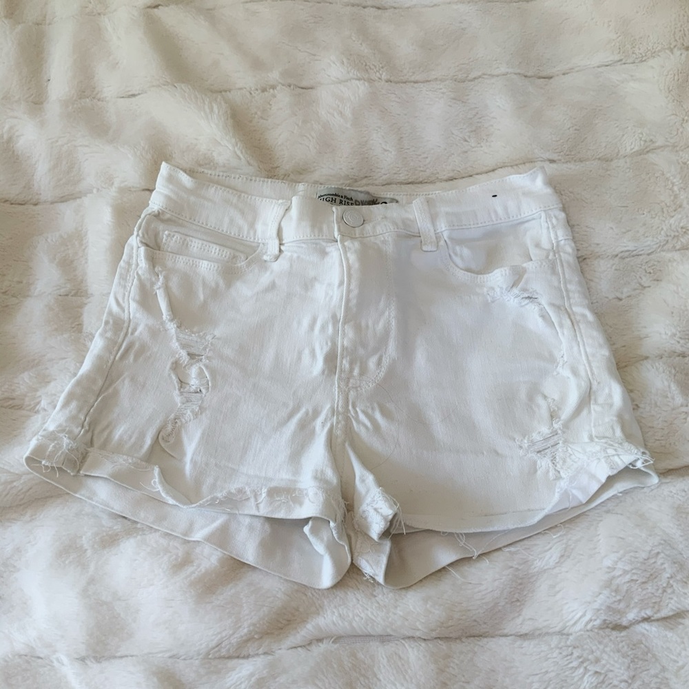 Ripped high rise white jean shorts